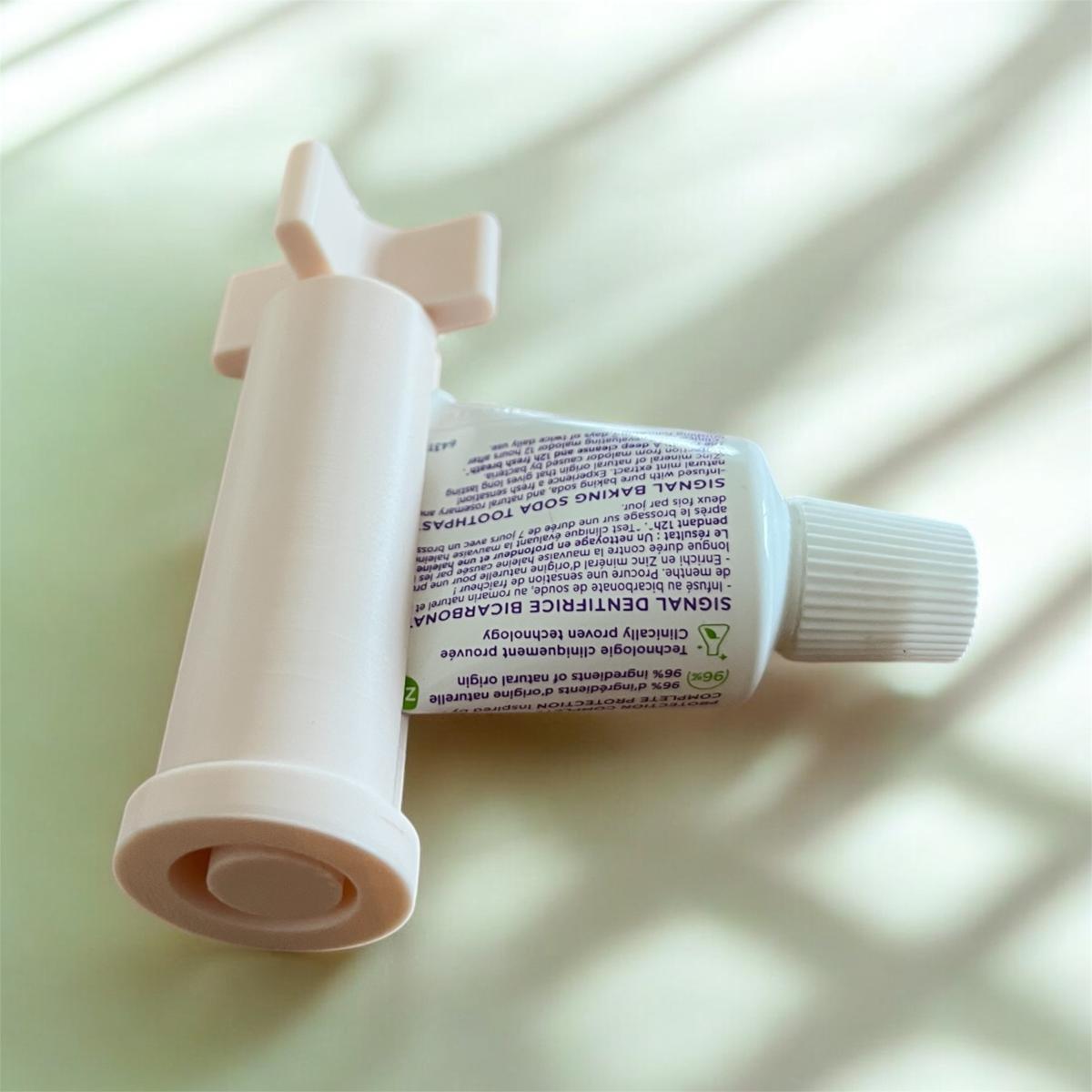 Presse dentifrice